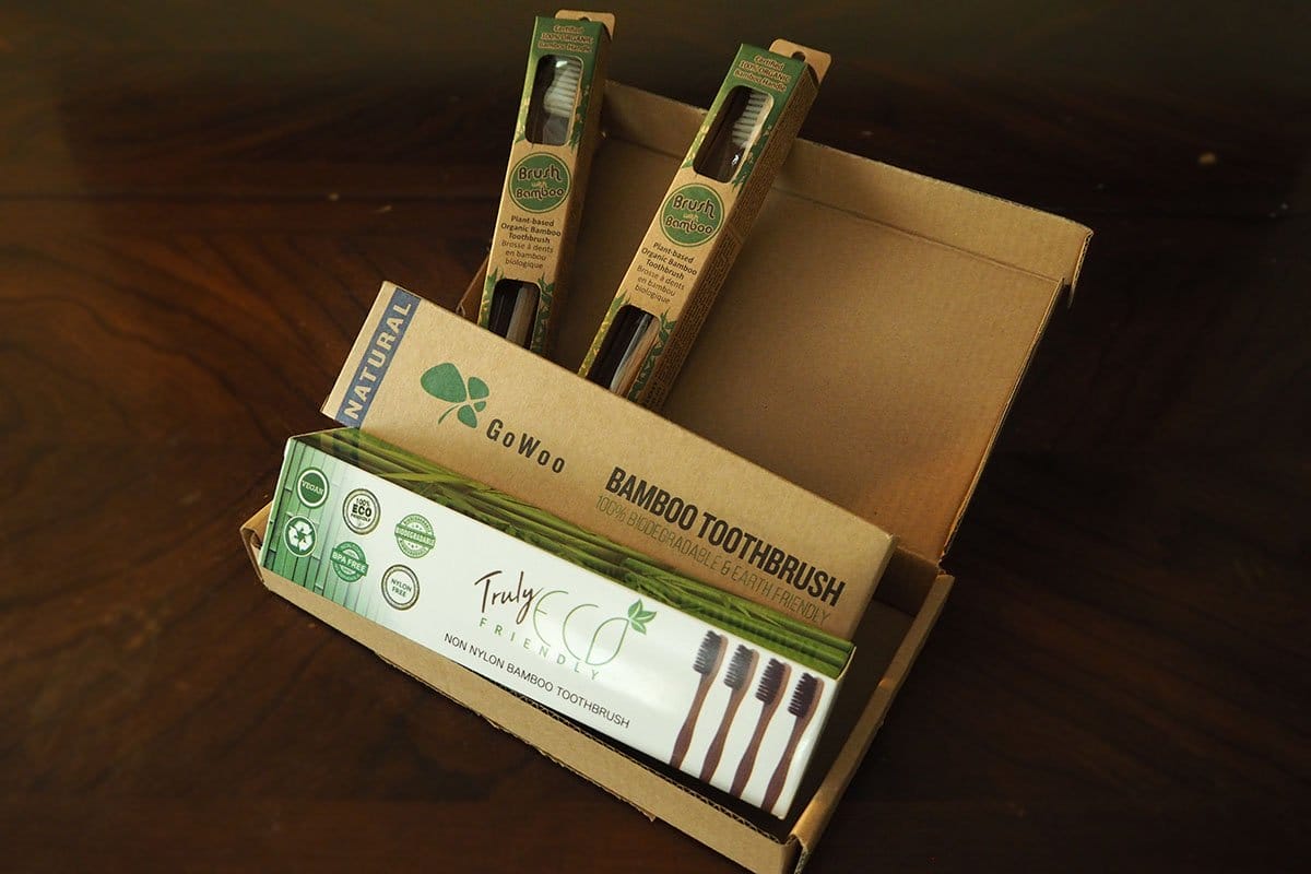 Different bamboo toothbrush brands in their packaging