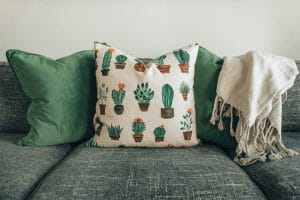 White and green throw pillow