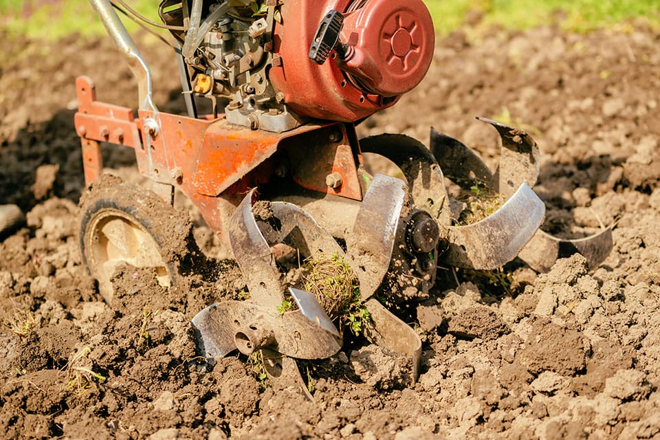 Garden tiller with heavy soil
