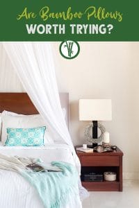 Bed with nightstand and the text: Are Bamboo Pillows Worth It?