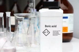 Bottle of boric acid in a laboratory as a preservative to treat bamboo for outdoor use
